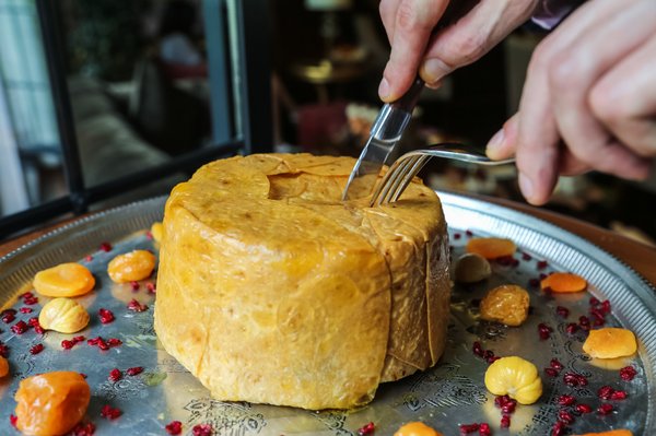 How can you add a modern flair to a traditional spotted dick?